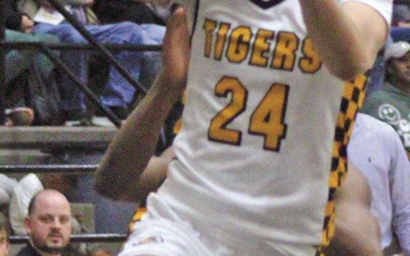 Carter Chism and the Mount Pleasant Tigers ran their district record to 3-0 Friday with a home win over Texas High. Mount Pleasant hosted Pine Tree Tuesday and will travel to co-district leader Longview Friday. TRIBUNE PHOTO / QUINTEN BOYD