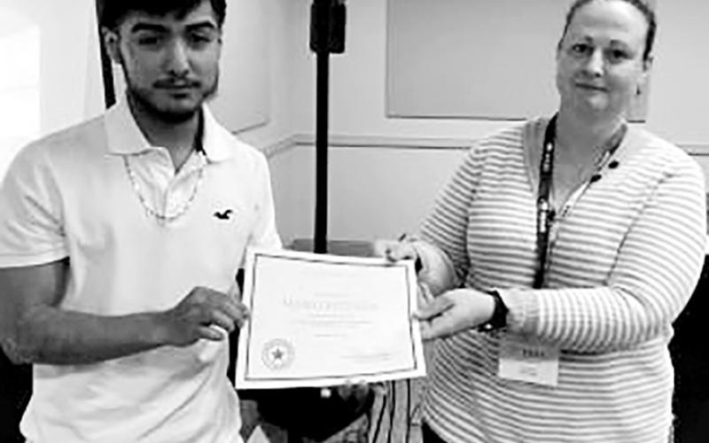 Estrada winning a Caldwell Award in Austin, 2022 COURTESY PHOTOS