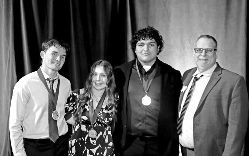 Business Ethics National qualifiers (L to R) Tanner Marshall, Kate Ball, Evan Cota and FBLA Advisor John Whitten