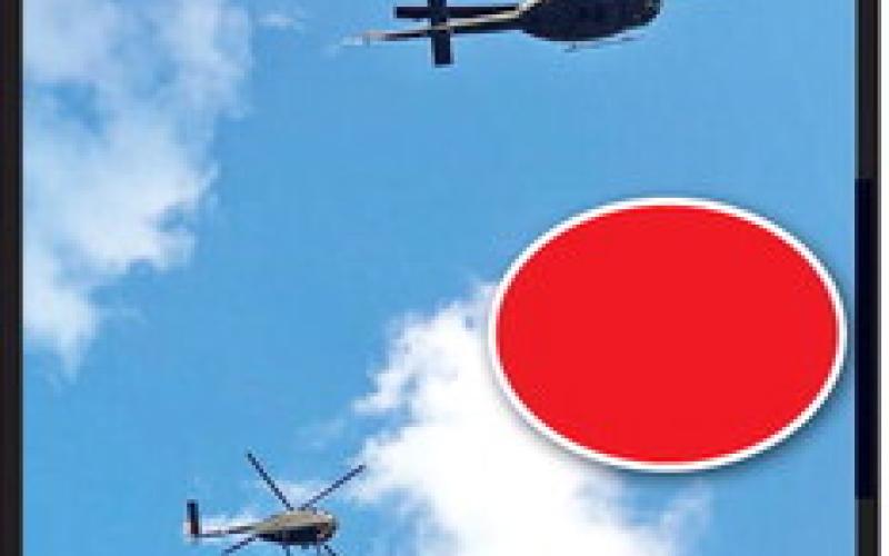 Helicopter flyover during the honoring of veterans