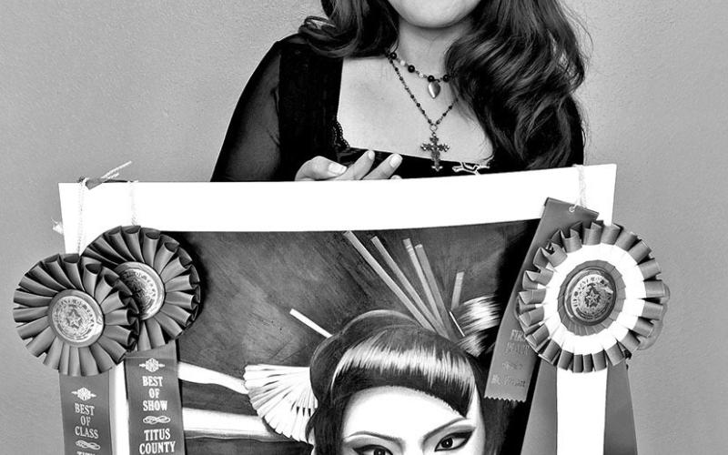 Dayanara Pulquero with her Sweepstakes award winning piece, voiceless fear