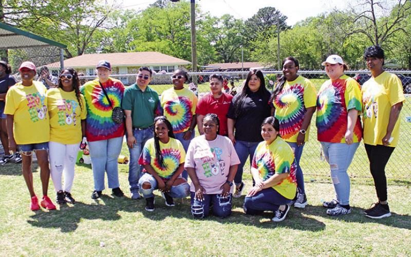 Pilgrims volunteers and event organizer Danielle McCoo gather immediately following the Easter Eggstravaganza at Oaklawn Park. McCoo said this year’s edition was likely the largest in the event’s history.