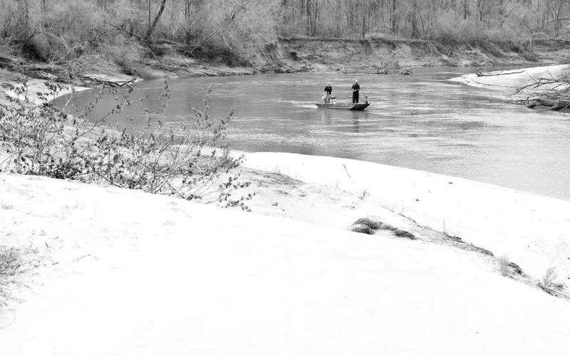 Major river systems that feed large reservoirs with abundant white bass populations are prone to come alive with the brawny sport fish during early spring as the annual spawning run kicks in to gear. (Photo by Matt Williams)