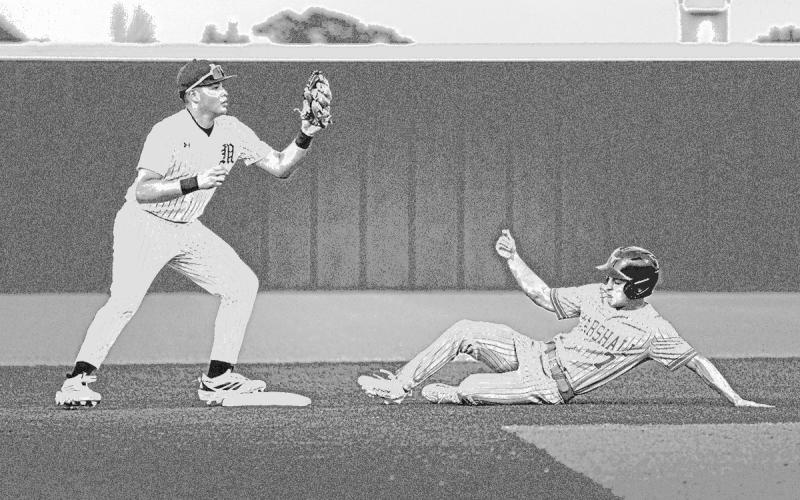 Nate Copado looks to turn two during the Tigers win over Marshall.