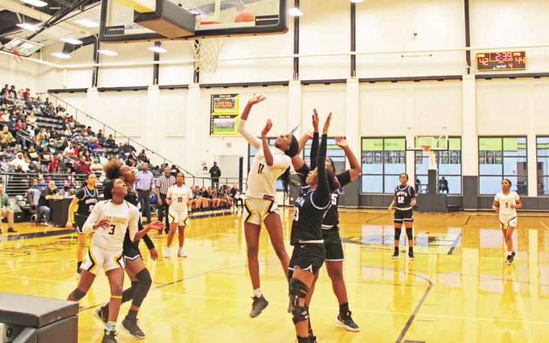 Aziyah Farrier puts up a shot during Mount Pleasant’s area round playoff game against North Forney. TRIBUNE PHOTO / QUINTEN BOYD