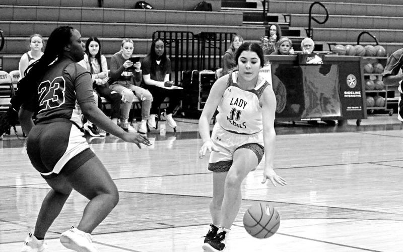 Rivercrest’s Diana Kelley makes a move towards the basket during last week’s game against Daingerfield. The Lady Rebels won, 47-9. Rivercrest will take on Paris Warriors Thursday evening and host Bloomburg Friday afternoon. TRIBUNE PHOTO / QUINTEN BOYD