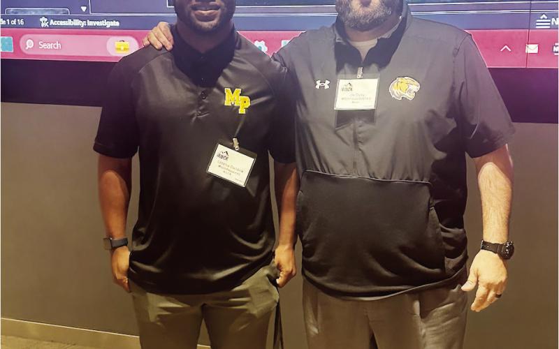 MPISD Coach Ladarius Craddock (left) and MPISD Athletic Director Joey Cluley at the R.O.C.K. Symposium