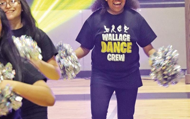 3rd period dance class members Ashley Chavez (left) and Madison Cheatum (right) perform their class dance