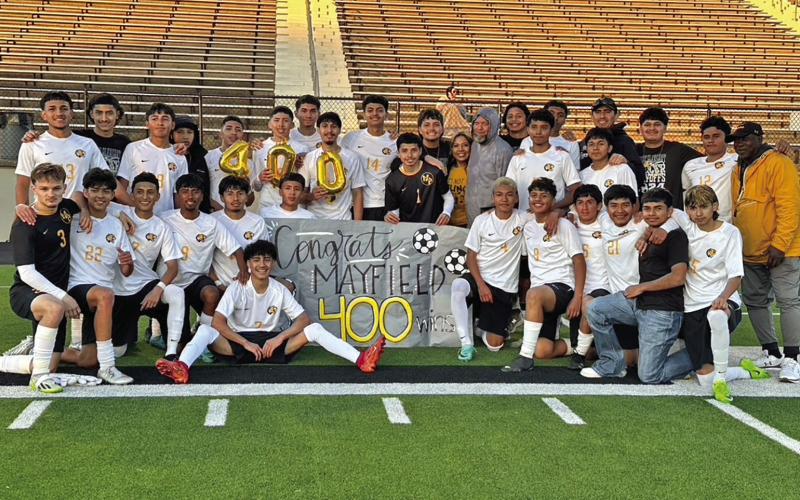 Mount Pleasant High School soccer coach, Jason Mayfield, earned his 400th win on Tuesday, March 26 in the bi-district playoff game vs. Lufkin. The Tigers defeated Lufkin 4-0 and have moved on to round 2 of the UIL 5A playoffs. They will play Sherman at Paris High School at 2:30 p.m. on Friday, March 29. COURTESY PHOTO