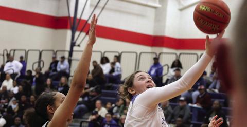 Anna Duvall drives for a layup during Friday’s district playoff against Clarksville. The Rivercrest Lady Rebels took on Quinlan Boles in the bi-district round Monday evening. PHOTO BY QUINTEN BOYD