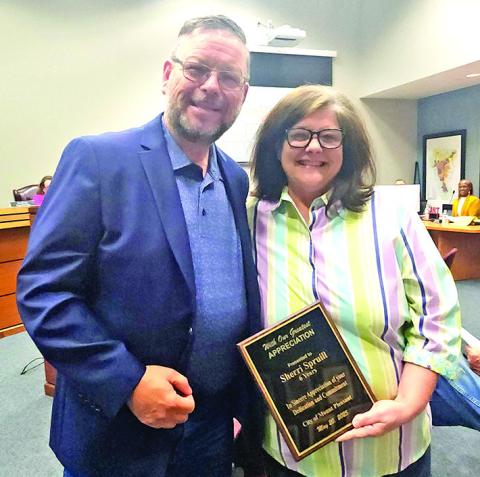 Former council member Sherry Spruill poses with Mayor Wesley Lyon