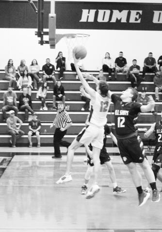 Red Devils defeat Trojans