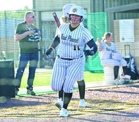 Mount Pleasant’s Lakyn Fortenberry makes her way home for a run during the Lady Tigers’ game Friday against Tyler High. Mount Pleasant won the district matchup, 17-0. TRIBUNE PHOTO / QUINTEN BOYD
