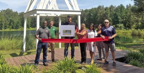 A hidden retreat in north Titus County snips the red ribbon