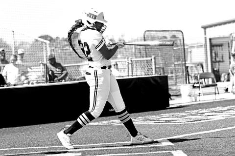Azlyn Fluellen drives the ball up the middle for a double vs. Texas High.
