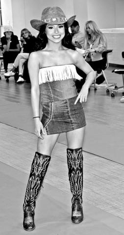 Aaliyah Dela Rosa models a denim set designed by Gabby Zachry