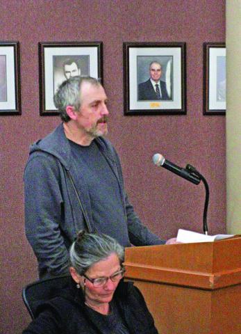 Andrew Arnold presents annual audit.
