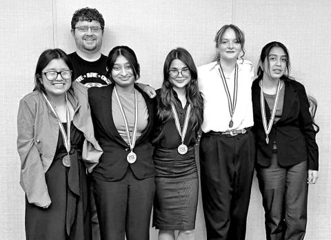 MPHS Congressional Debate team (L to R) Natalia Aspeitia, MPHS Debate coach Joel Whitaker, Gopi Amin, Sabrina Otero- Svirska, Caitlin Anderson, Raquel Garza COURTESY PHOTO