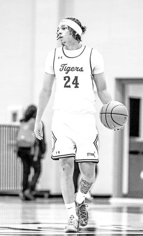 Carter Chisum led the Tigers against the Wildcats with 23 points.
