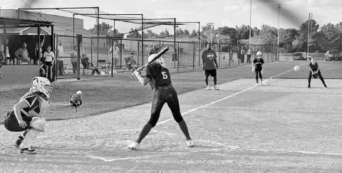 Kaylin Brannon at bat for the Lady Devils. COURTESY PHOTO