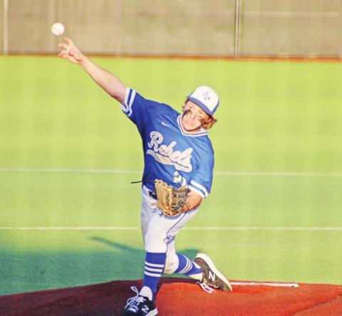 RIvercrest’s Chance Duffer unloads a pitch during the Rebels’ series against Centerville. The Rebels fell in the best of three series, 2-0. Rivercrest’s season ends at 21-11. TRIBUNE PHOTO / QUINTEN BOYD