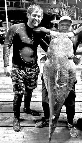 In June 2023, Lake Tawakoni noodlers Justin White and Drew Moore snatched this 98.7 pound flathead catfish from an old concrete washout at the base of a bridge crossing in about 14 feet water. It may be the biggest Texas flathead ever noodled and documented on certified scales. The fish was released alive. (Courtesy Photo)