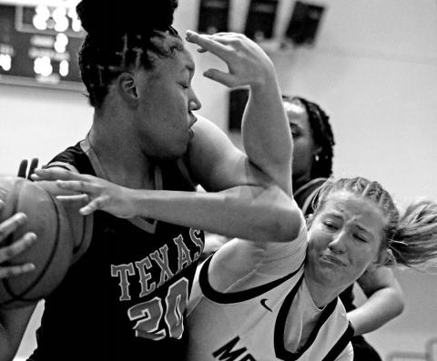 Fight For Ball Mount Pleasant’s Eva Hampton (5) fights for the ball during a recent home victory against Texas High. The Lady Tigers, who picked up a 71-40 win over Marshall last week to improve to 9-4 in District 10-5A, will travel to Lufkin on Friday and host Whitehouse on Tuesday.