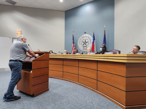Developer Jon Anderson speaks to the council.