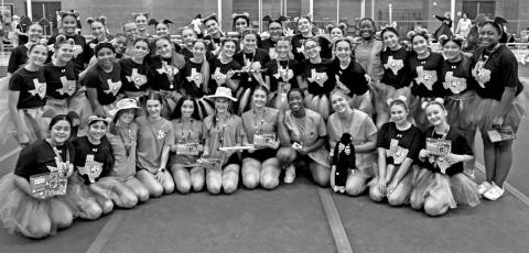 The MPHS cheerleaders with the UCA staff and their camp awards