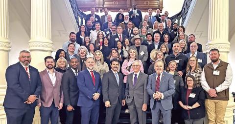 Members of the Northeast Texas Regional Alliance pose for a photo with U.S. Congressman Nathaniel Moran, State Senator Bryan Hughes (District 1), and State Representatives Gary VanDeaver (District 1), Brent Money (District 2) and Cole Hefner (District 5) during the 2025 Legislative Summit held in Austin, Texas on Feb. 19. COURTESY PHOTO / TINA BELL