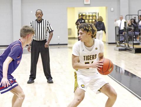 Mount Pleasant’s Carter Chism scans the floor during Tuesday’s game against Bullard. The Tigers defeated the Panthers in a battle of state-ranked squads, 52-35. TRIBUNE PHOTO / QUINTEN BOYD