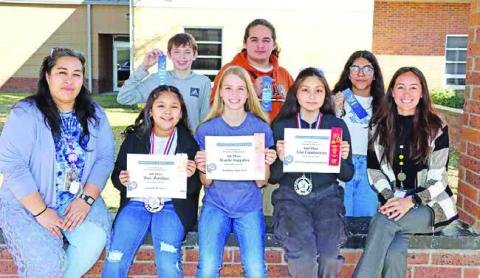 MPJH: Front (L to R) Advisor Maria Sanchez, Zoe Zuniga, Katie Snyder, Lia Contreras, Advisor Martina Ramirez. Back (L to R) Aiden Lane, Jose Olivares, Angela Ramirez