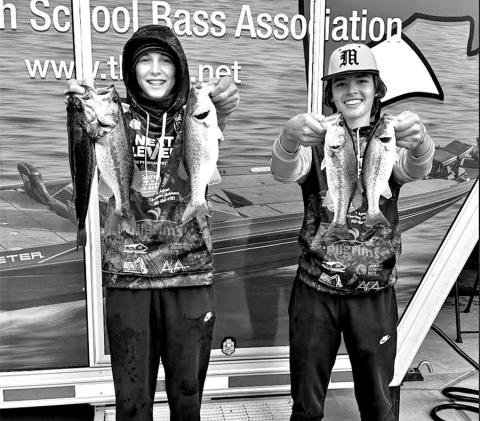 Joe Setina (left) and Hayden Harvill with their catches of the day
