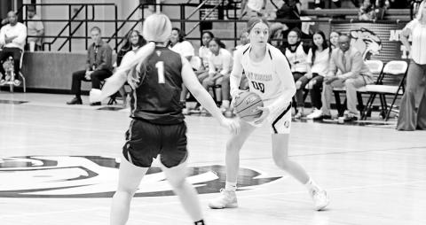 Mount Pleasant’s Ella Cross scans the court during a recent game. The Lady Tigers are 2-0 on the season and traveled to New Boston Tuesday. Mount Pleasant will play in the Crandall Tournament this weekend. TRIBUNE PHOTO / QUINTEN BOYD