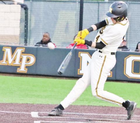 Layne Pinckard drives the ball. PHOTO BY JOHN WHITTEN