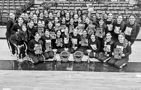 The Tiger Dolls with their awards from the S howtime International Texas State Championship COURTESY PHOTOS
