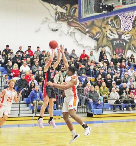 Chapel Hill’s Braden Buchanan puts up a shot during a recent game. The Red Devils took on Tatum Friday evening in an area round matchup. TRIBUNE PHOTO / QUINTEN BOYD
