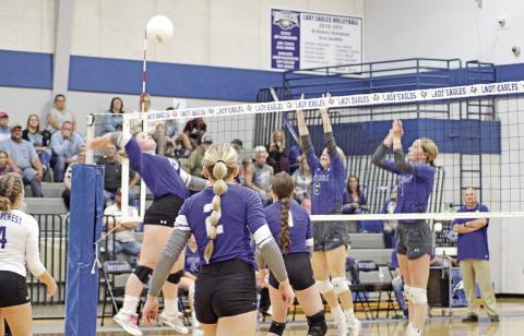 Rivercrest’s Elizabeth Langehennig jumps for a spike during Tuesday’s game at Detroit. The Lady Rebels and Lady Eagles are tied for first place in District 17-2A after Detroit’s 3-2 win. Rivercrest hosted Clarksville Friday. TRIBUNE PHOTO / QUINTEN BOYD