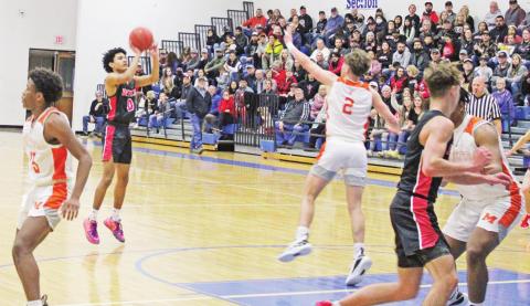 Jaydyn Haley takes a shot during Friday’s seeding game between Chapel Hill and Mineola. The Red Devils went into the playoffs as the district’s second seed and took on New Boston Tuesday at Marshall High School. TRIBUNE PHOTO / QUINTEN BOYD
