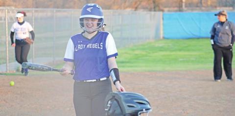 RIvercrest’s Macy Childres shares a laugh with crowd members between innings of a recent game. TRIBUNE PHOTOS / QUINTEN BOYD