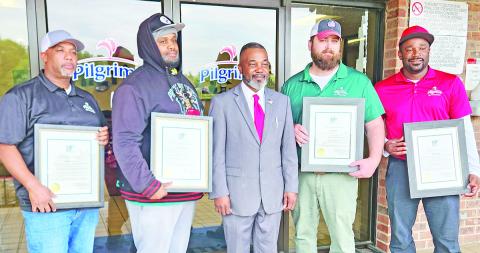Four men receive awards from the Mayor for their acts of bravey during an April 1st fire TRIBUNE PHOTO / NICOLE KIMBALL