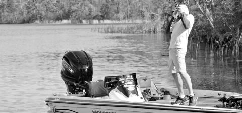A few pitches later, Driscoll fooled the aggressive male into biting. After releasing the fish, he moved on to look for another.