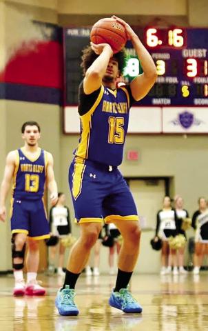 Harts Bluff’s Cayden James (15) hits two huge free throws down the stretch in the area win over Alvord on Friday night. COURTESY PHOTO
