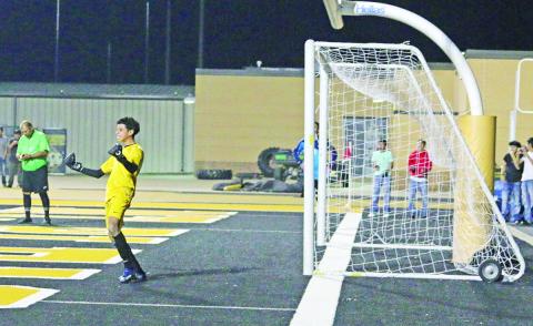 Mount Pleasant goalkeeper Edgar Lopez celebrates after stopping a Whitehouse penalty shot. The Tigers went on to win in penalties, 4-2. TRIBUNE PHOTO / QUINTEN BOYD