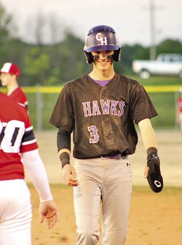 CHAAMP’s Drew Wigley is all smiles after reaching first base for the fourth time on the night. Wigley mustered two hits and two walks in 5 plate appearances.
