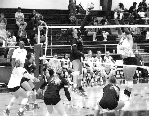The Lady Red Devils from Chapel Hill swept a three game non-district matchup with the New Boston Lady Lions last week by a score of 25-15, 25-21 and 25- 13. COURTESY PHOTO