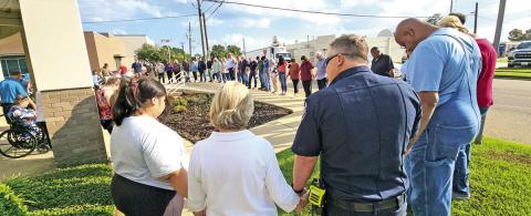 Dozens join hands at Mount Pleasant City Hall on Prayer Day