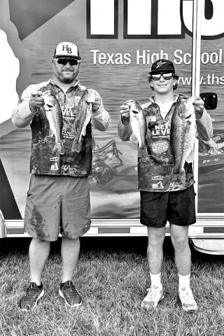 State qualifier Logan Holderness (right) and Boat Captain Danny Holderness
