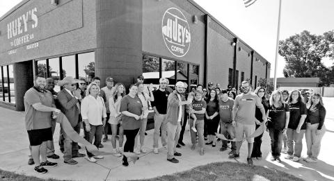 On September 13, the red ribbon is cut for the official opening for Huey’s Coffee in Mt. Pleasant TRIBUNE PHOTO / NICOLE KIMBALL