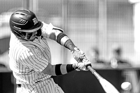 Drew Cross connects during his first at bat and hits a towering home run into left-center field vs. Texas High.